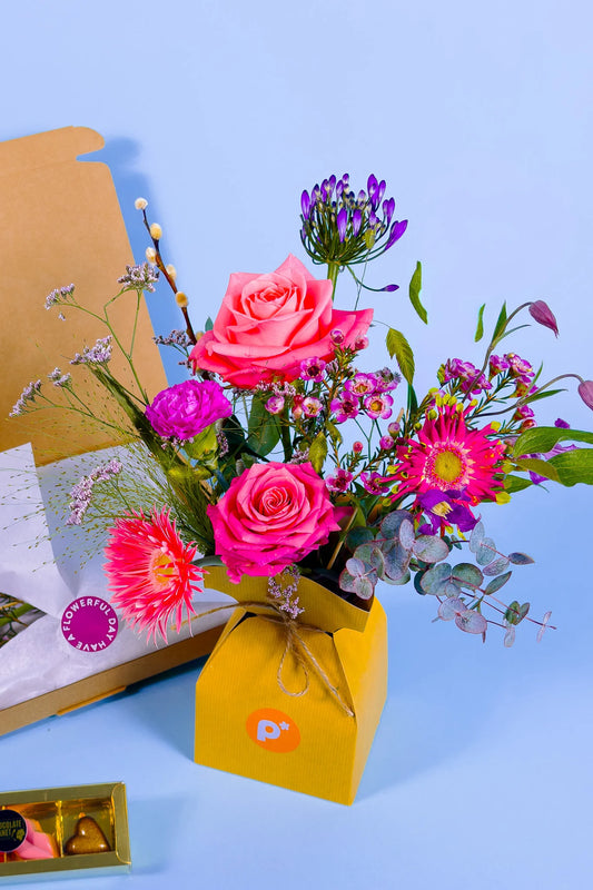 Prachtige roze bloemen met bon bons
Heerlijk cadeau