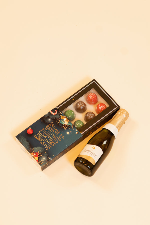 Kerstbon bons met prosseco en bloemen het ultieme kerst cadeau