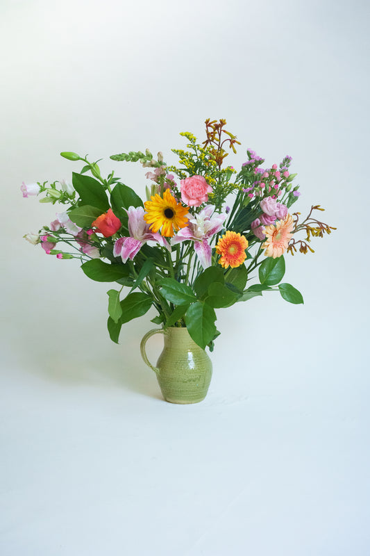 Gerbera boeket. Bijpassende glazen vaas en persoonlijke boodschap mogelijk!