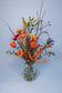 Duurzaam herfstboeket met oranje bloemen – bestel jouw bos vandaag.
